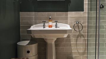 Designer toiletries, hair dryer, bathrobes, towels