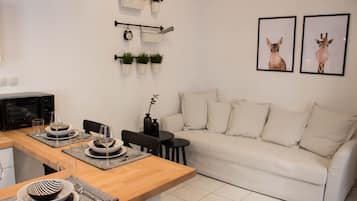 Apartamento urbano (SSA 6) | Área de estar | TV de tela plana