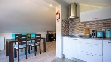 Family Apartment, 3 Bedrooms (Maisonette) | Private kitchen | Full-size fridge, microwave, oven, stovetop