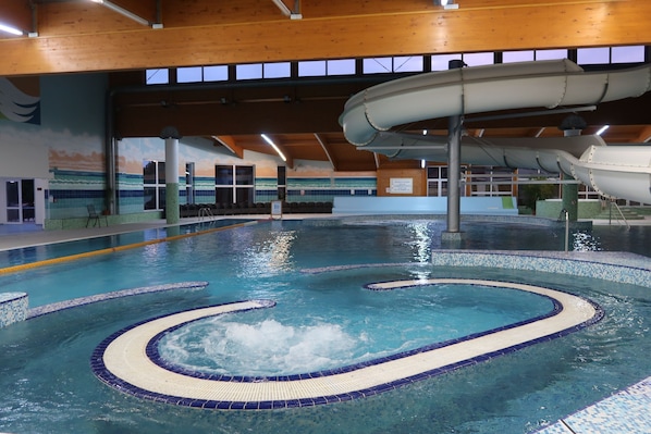 Outdoor pool, open 11:00 AM to 9:00 PM, pool umbrellas, pool loungers