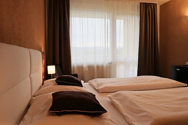 Chambre Confort | Bureau, chambres insonorisées, Wi-Fi gratuit