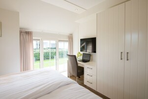 Villa (Wellness Lodge XXL 6) | Blackout drapes, iron/ironing board, cribs/infant beds, free WiFi