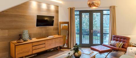 Apartamento de lujo | Zona de estar | Una televisión de pantalla plana