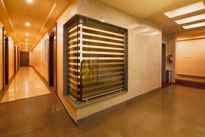 Superior Studio Suite | Living area | 32-inch flat-screen TV with satellite channels, TV - Aloka Stay Inn (Vellore)