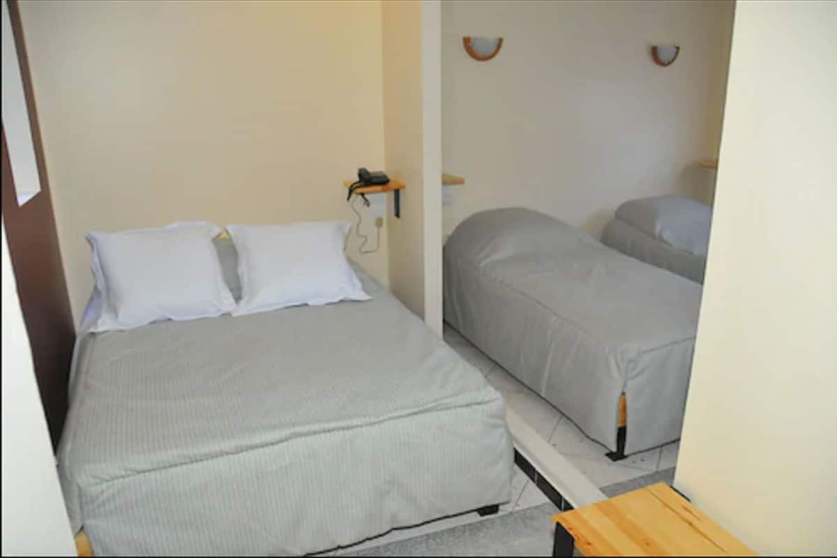 Desk, blackout drapes, cribs (free), WiFi (free)