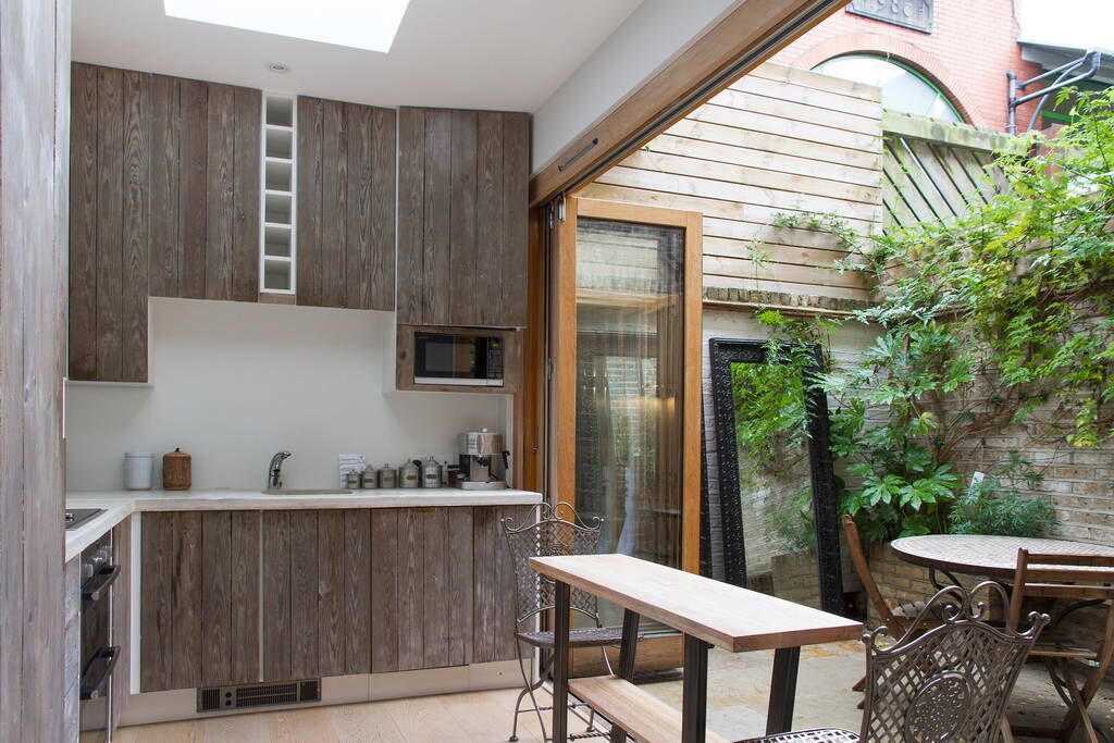 One-Bedroom Apartment | Private kitchen | Full-sized fridge, microwave, oven, stovetop