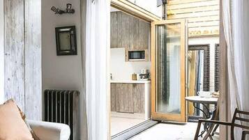 Luxury-Apartment | Wohnbereich | Flachbildfernseher