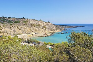 A coastal area with a beach, rocky cliffs, and a clear blue sea. - MADISON - 3Bed Villa with private pool within walking distance to Pernera Resort Center (Paralimni)