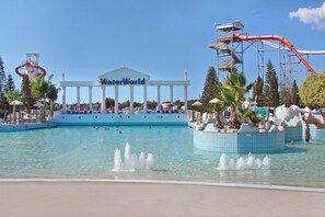 A water park with a large pool, a WaterWorld pavilion, and a water slide.