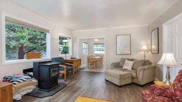 Flat-screen TV, fireplace, DVD player, table football