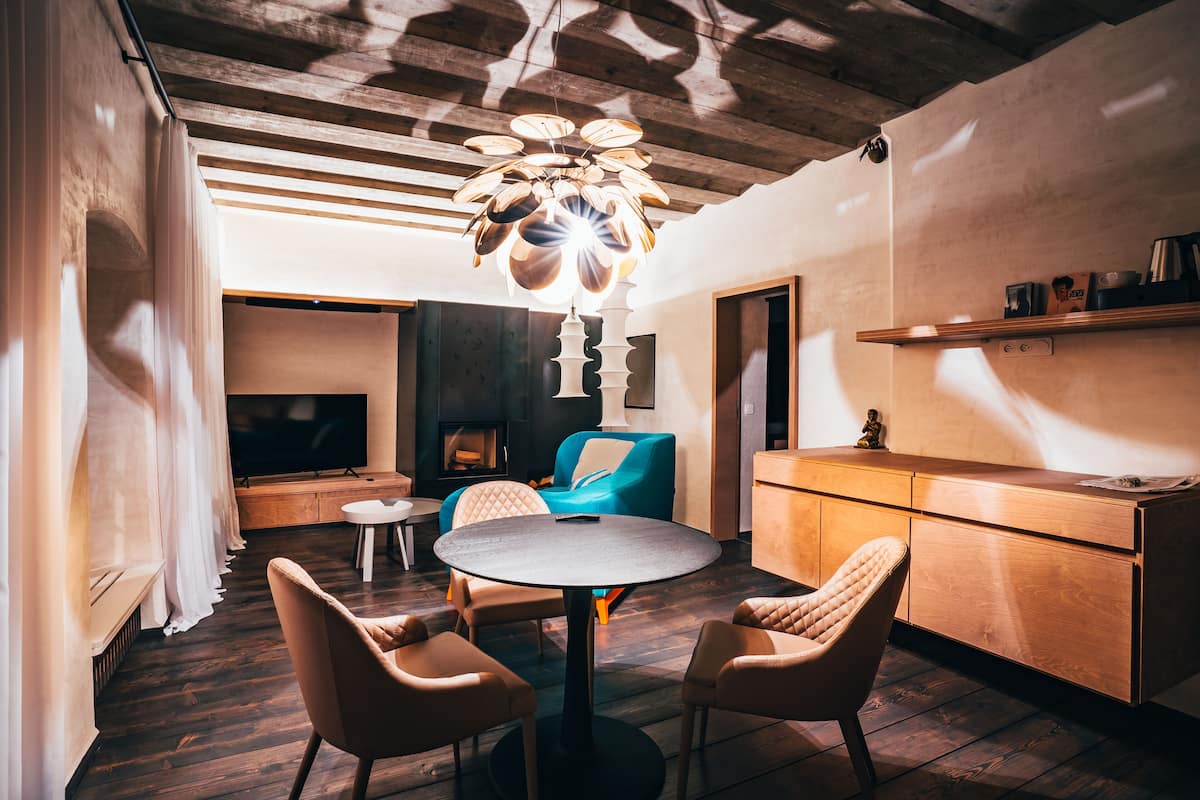 Exclusive Apartment, Jetted Tub | Living room | 127-cm flat-screen TV with satellite channels, TV, fireplace