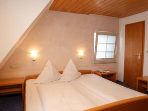 Hypo-allergenic bedding, desk, blackout drapes, soundproofing