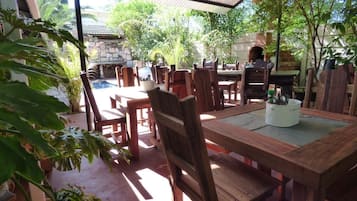 Breakfast, lunch, dinner served; local cuisine