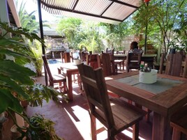 Breakfast, lunch, dinner served; local cuisine 