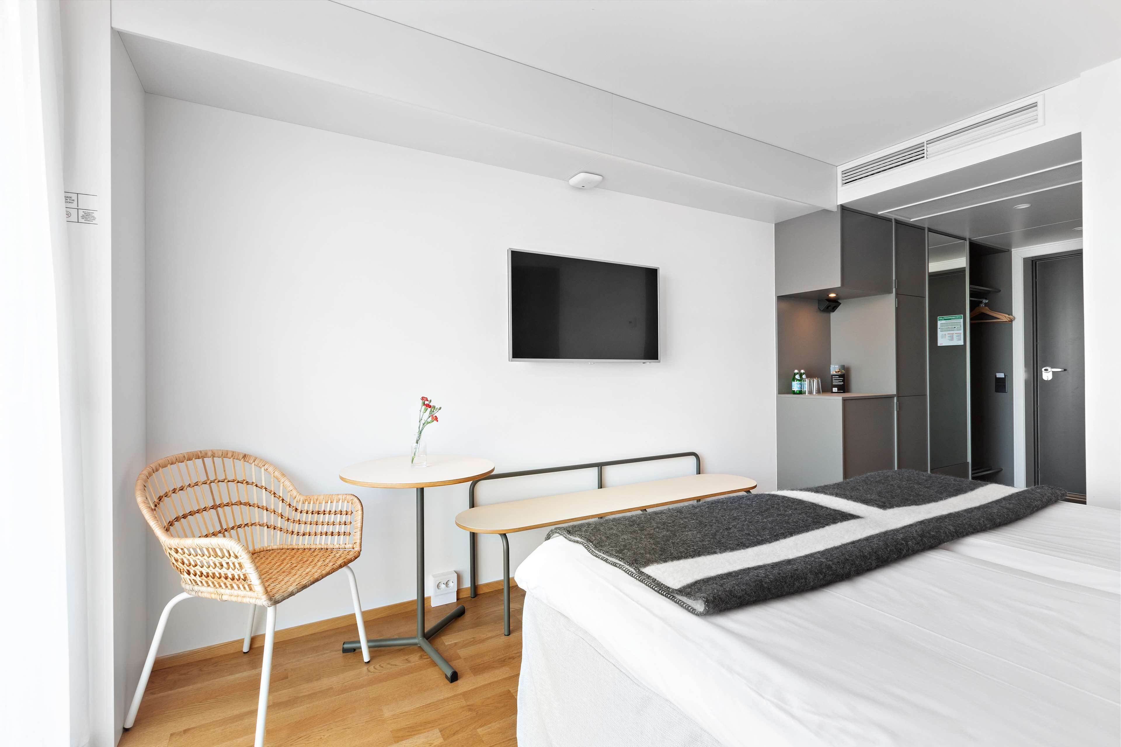 premium bedding, pillow-top beds, blackout curtains, soundproofing