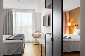 Premium bedding, pillowtop beds, blackout drapes, soundproofing