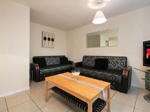 Business House | Living area | 43-inch LCD TV with digital channels, DVD player