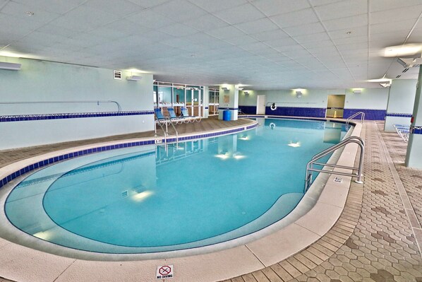 An indoor swimming pool with clear water, a no diving sign, and a tiled floor. - Majestic 3BR 2BA 17th Floor Tower 2!!! (Panama City Beach)