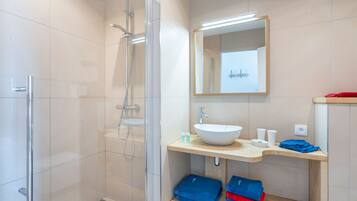 Hair dryer, towels, soap, shampoo