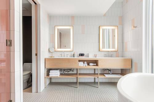 Suite, 1 King Bed with Sofa bed, Balcony | Bathroom | Free toiletries, hair dryer, towels, soap