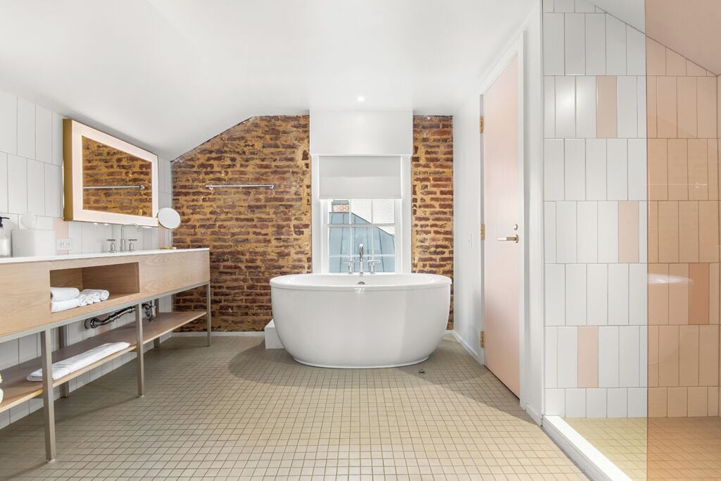 suite, 1 king bed with sofa bed, annex building | bathroom | free toiletries, hair dryer, towels, soap