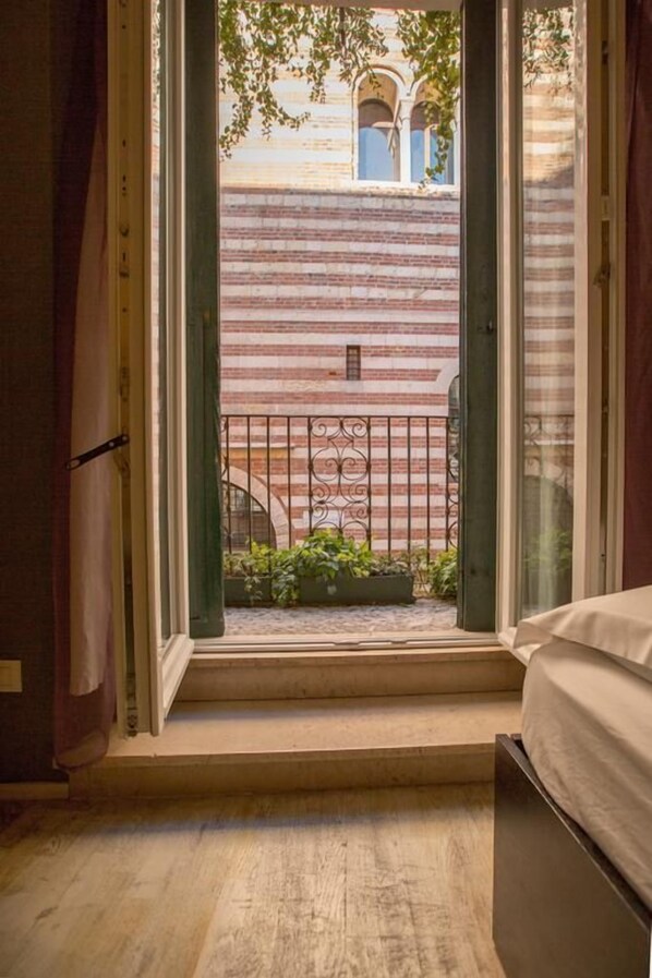 Chambre Triple, balcon | Wi-Fi gratuit