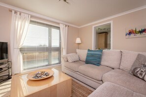 Appartement, 1 chambre | Aire de séjour | Téléviseur à écran plat