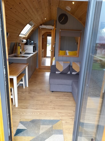 Luxury Cabin | Premium bedding, blackout curtains, bed sheets. North Star Glamping