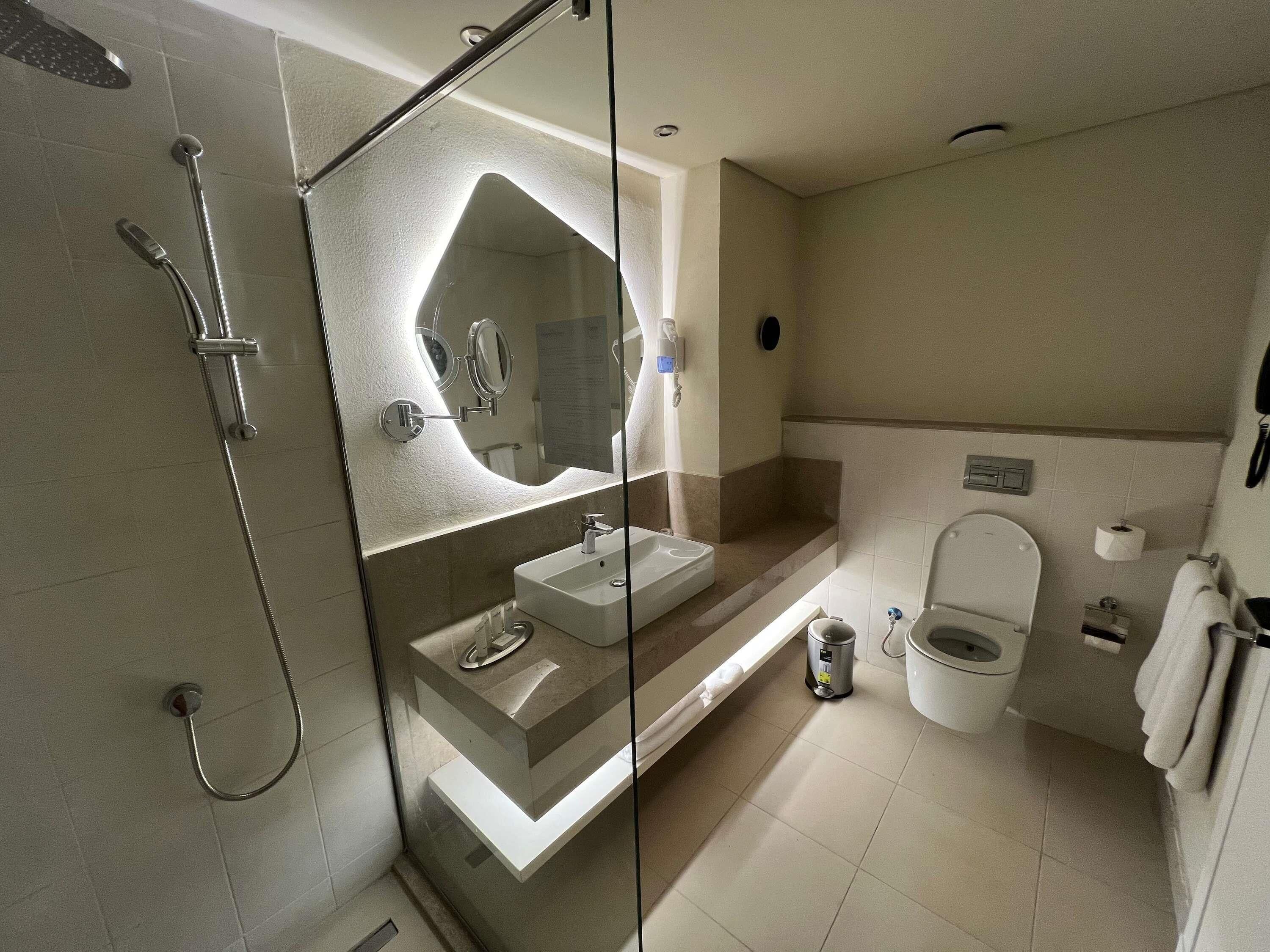 Bathtub, eco-friendly toiletries, hair dryer, bathrobes