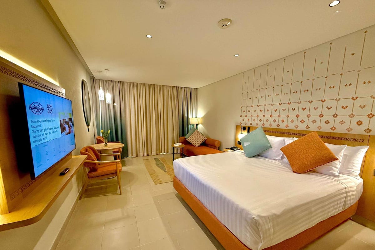 Superior Room, 1 King Bed, Sea View (Beach side) | Minibar, in-room safe, iron/ironing board, free WiFi