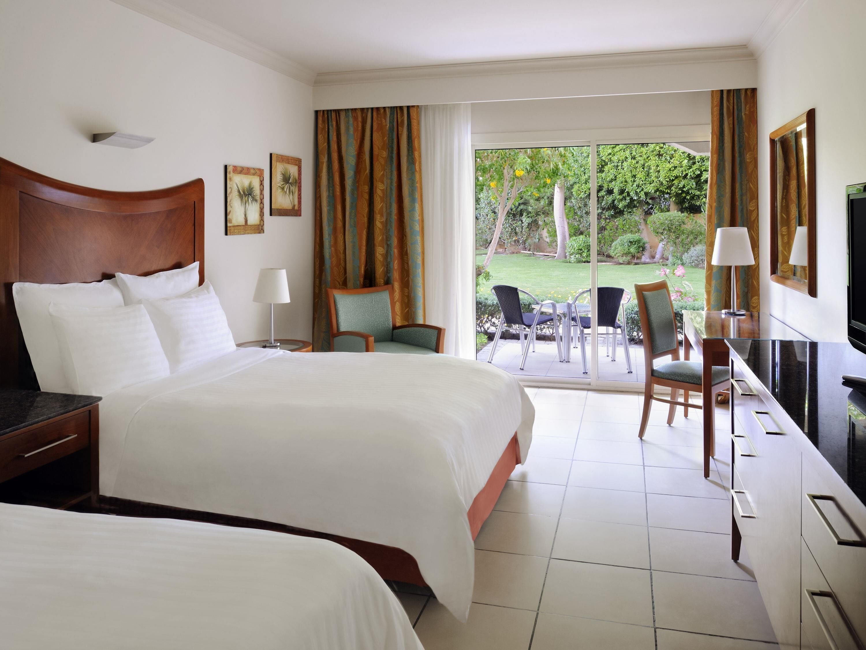 Deluxe Room, 2 Queen Beds, Garden View, Beachside | Minibar, in-room safe, iron/ironing board, free WiFi
