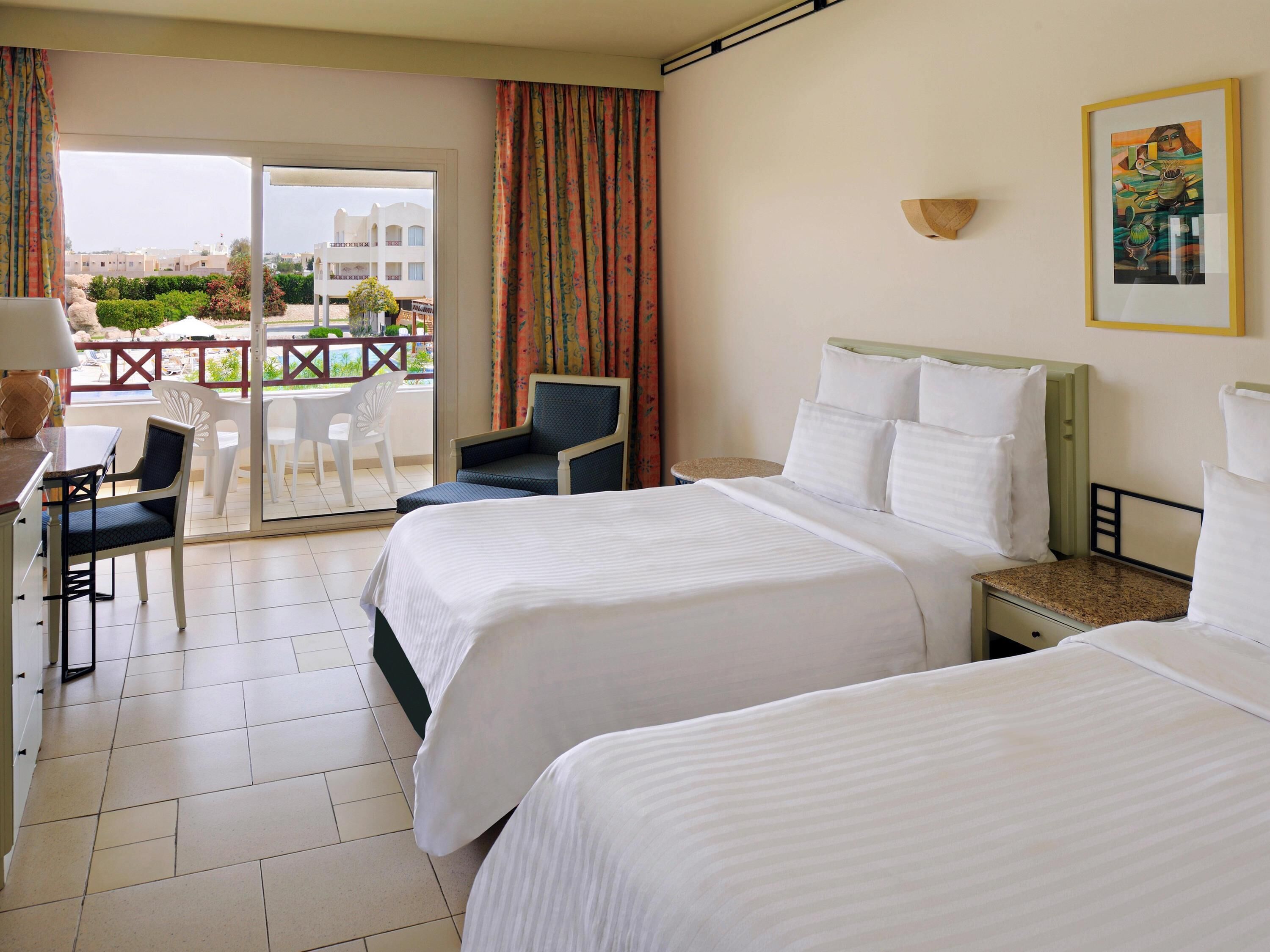 Standard Room, 2 Queen Beds, Pool View, Mountainside | Minibar, in-room safe, iron/ironing board, free WiFi