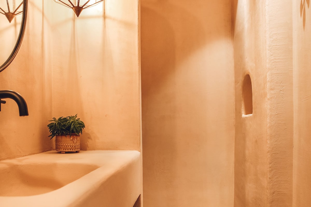 shower, hair dryer, bathrobes, towels