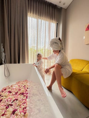 Suite | Premium bedding, down comforters, in-room safe, desk