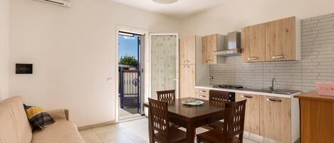 สแตนดาร์ดอพาร์ทเมนท์, 1 ห้องนอน (Bilo B) | ห้องนั่งเล่น | ทีวี