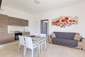 Standard Apartment, 1 Bedroom (Bilo A) | Private kitchenette | Full-sized fridge, oven, stovetop - Villa Poseidon (Porto Cesareo)