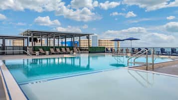 Outdoor pool, pool umbrellas, pool loungers