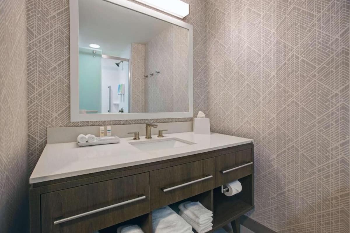 Eco-friendly toiletries, hair dryer, towels, soap