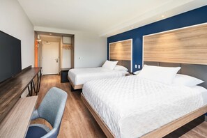 Tabla de planchar con plancha, wifi gratis y ropa de cama 