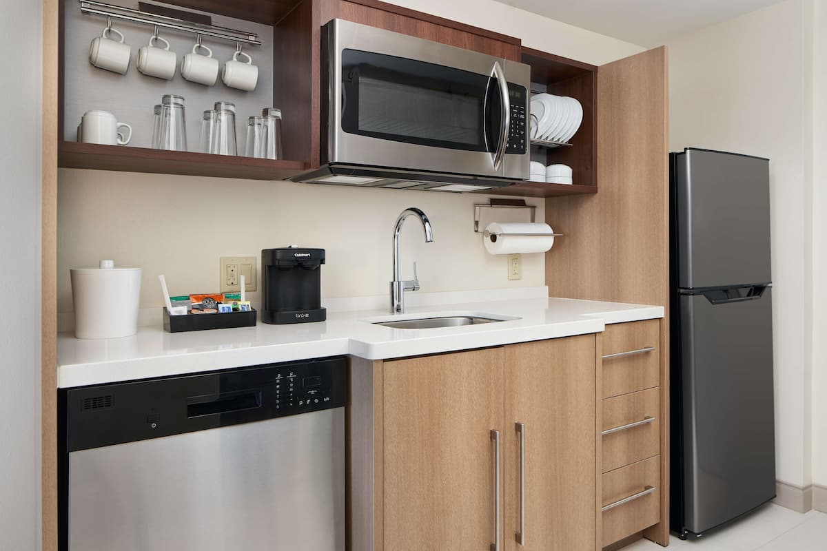 full-sized fridge, microwave, dishwasher, coffee/tea maker