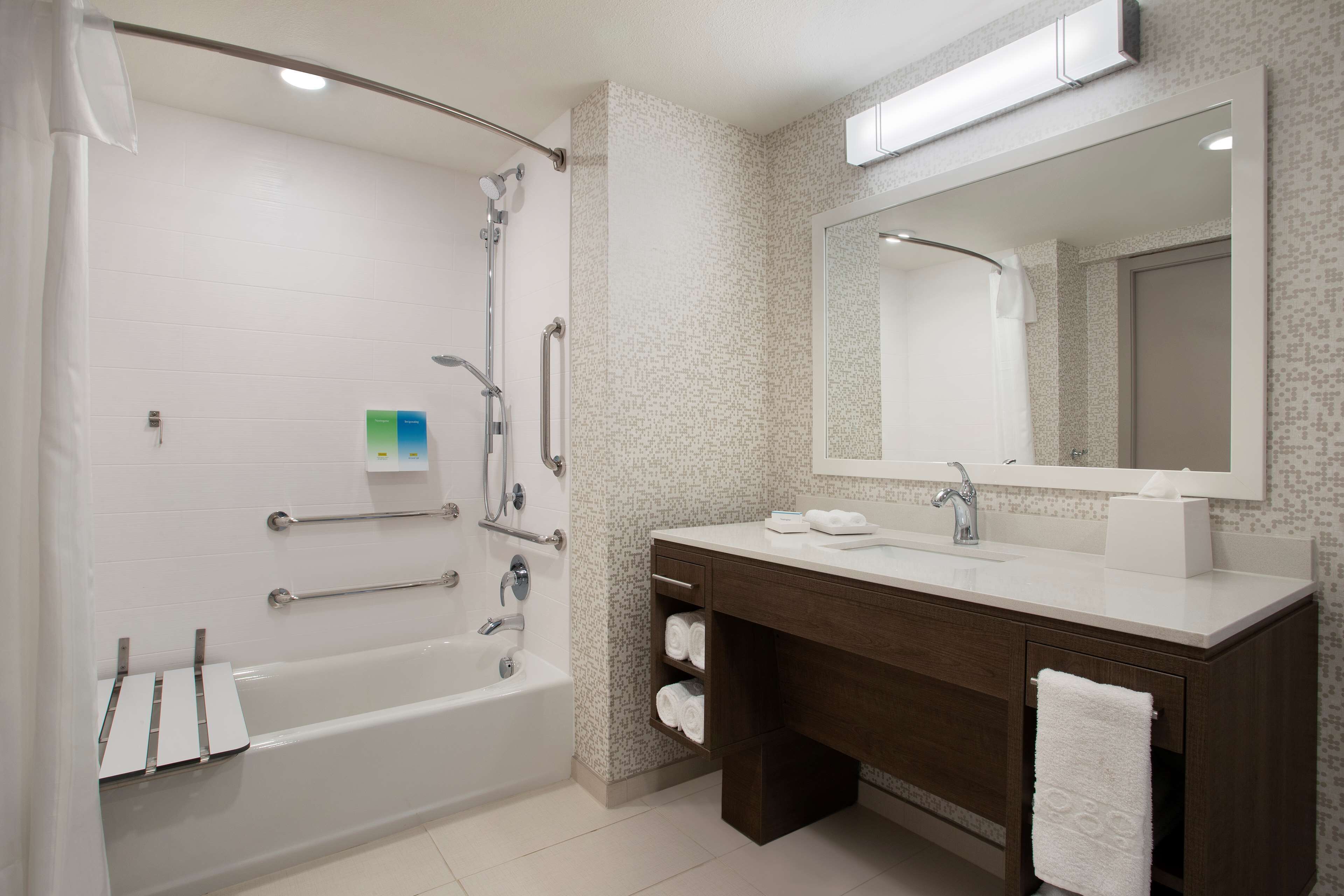 suite, 1 king bed, accessible, bathtub (mobility & hearing) | bathroom | eco-friendly toiletries, towels