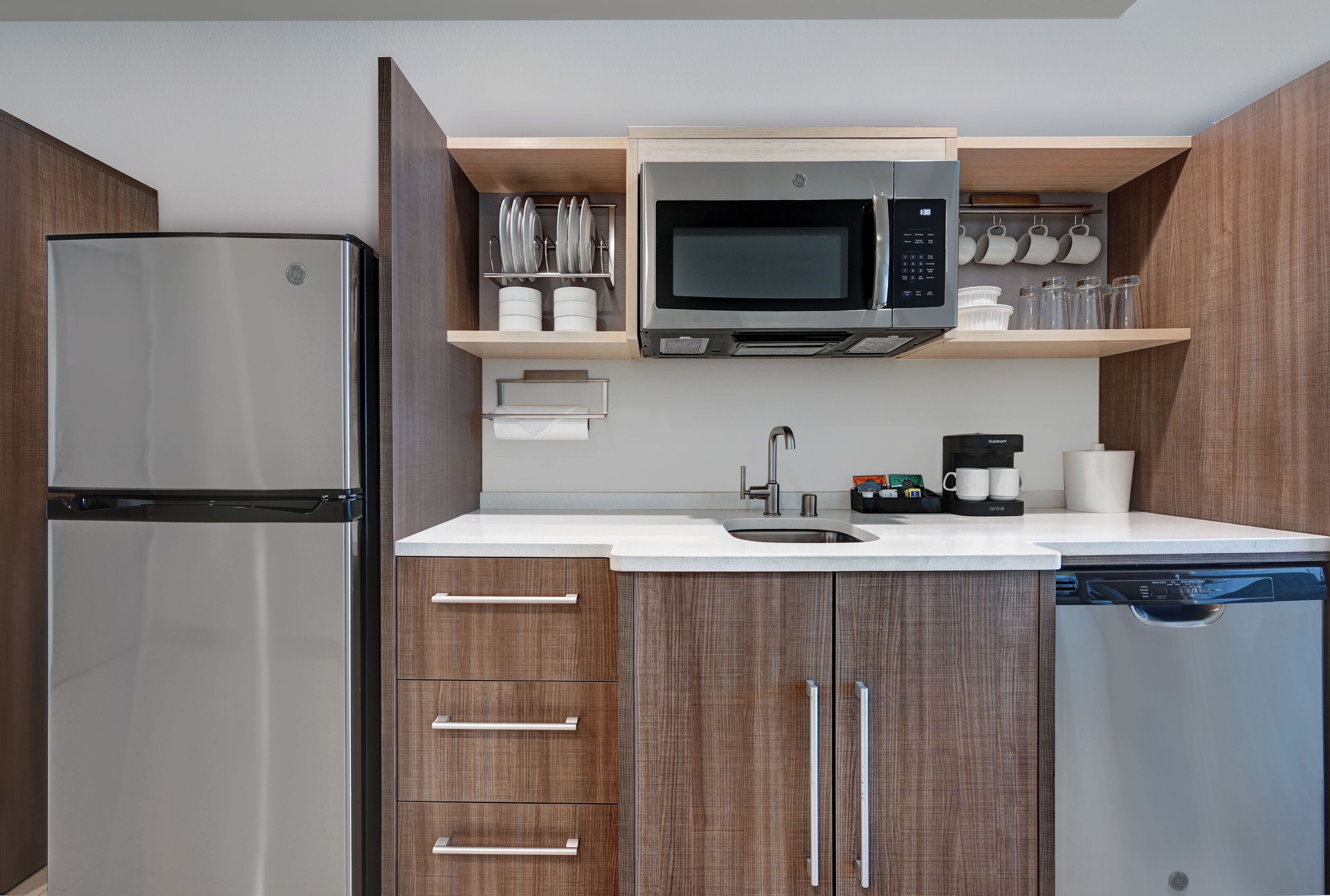 full-sized fridge, microwave, stovetop, dishwasher