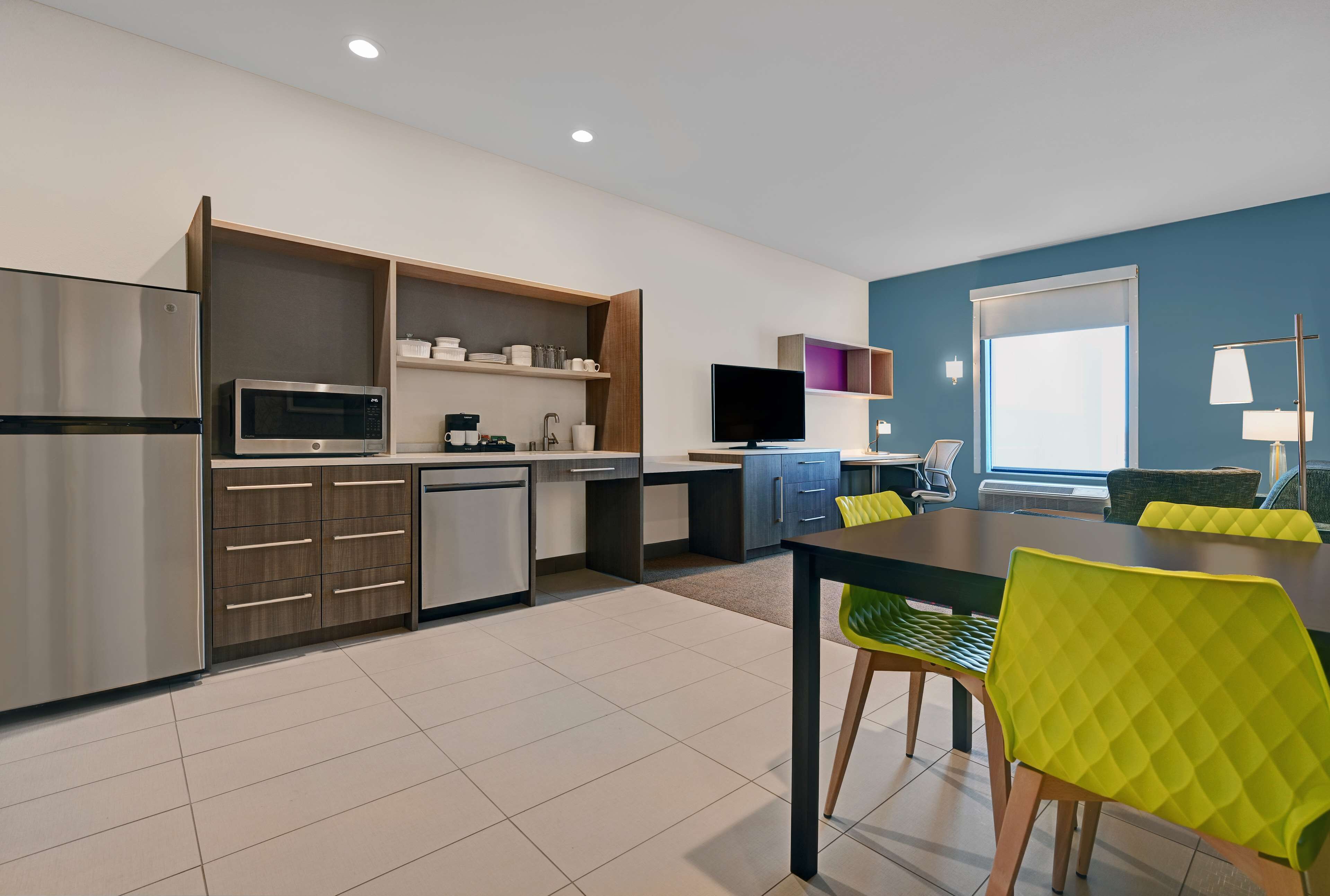 full-sized fridge, microwave, stovetop, dishwasher