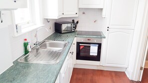 Apartment | Private kitchen | Fridge, microwave, oven, stovetop