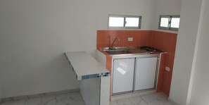 Stovetop, cookware/dishes/utensils - Apartestudios Mar De Kirá (Puerto Colombia)