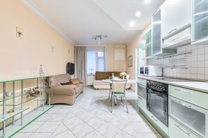 Apartment | Private kitchen | Full-size fridge, microwave, stovetop, electric kettle