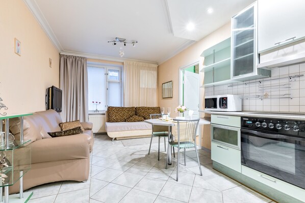Apartment | Private kitchen | Full-size fridge, microwave, stovetop, electric kettle