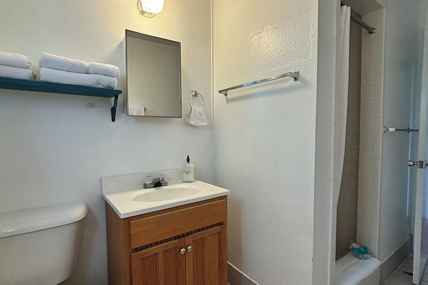Hair dryer, towels, soap, shampoo