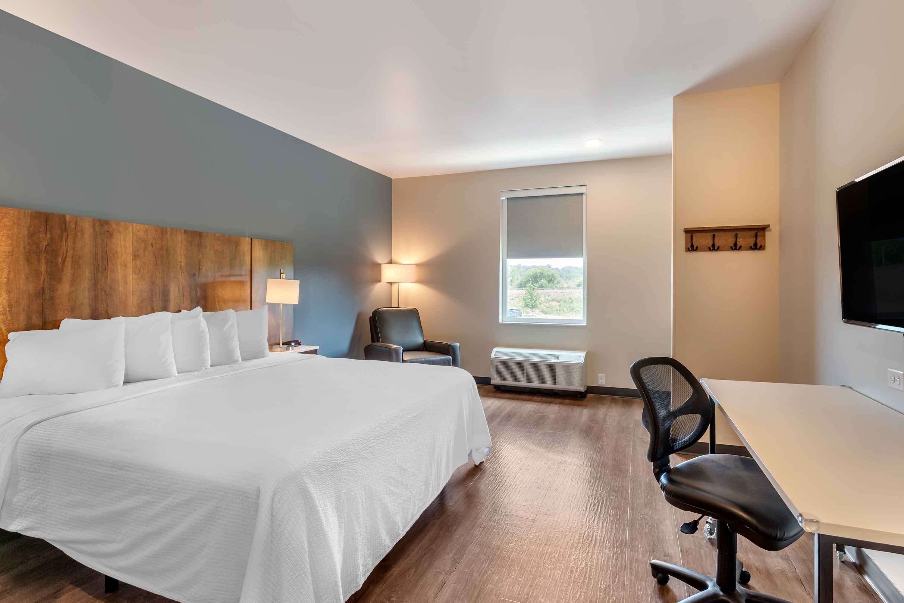 standard studio, 1 king bed, non smoking, refrigerator & microwave | desk, laptop workspace, iron/ironing board, bed sheets