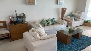 Apartment | Living room | Flat-screen TV - JUUB Acapulco, Exclusive Beachfront Apartment (Acapulco)